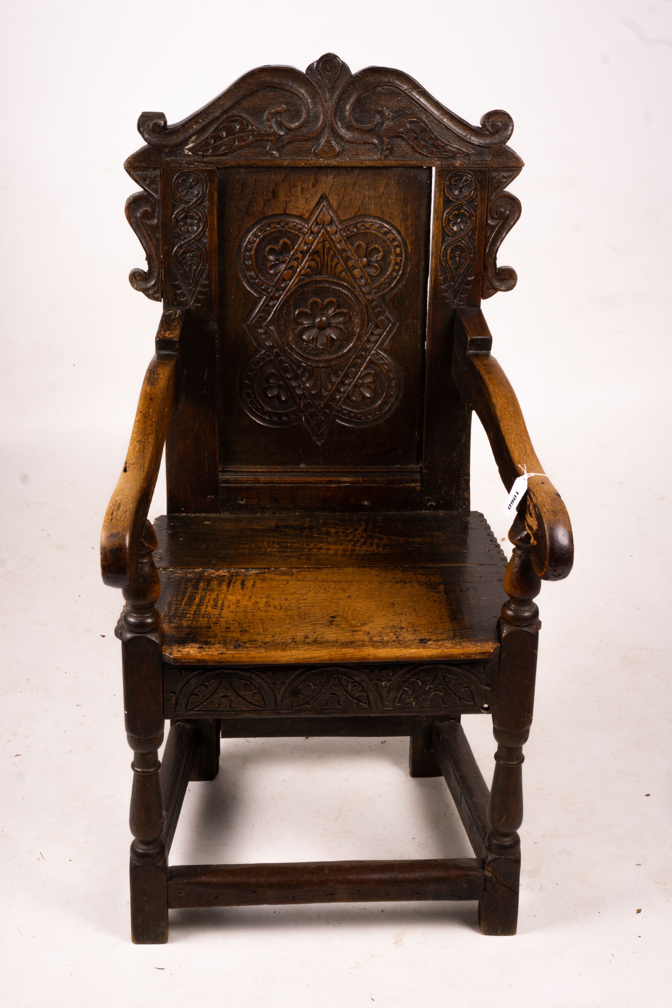 A 17th century style oak Wainscot chair, width 54cm, depth 52cm, height 104cm